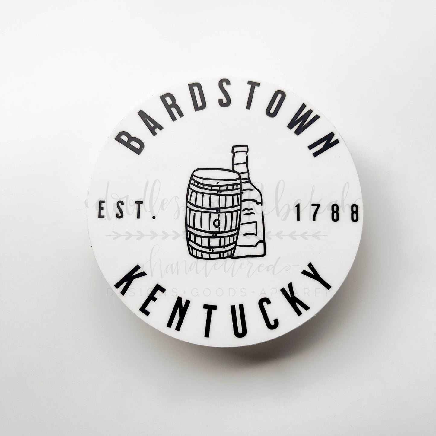 A round white sticker with the text 'BARDSTOWN KENTUCKY EST. 1788' and an illustration of a bourbon barrel.