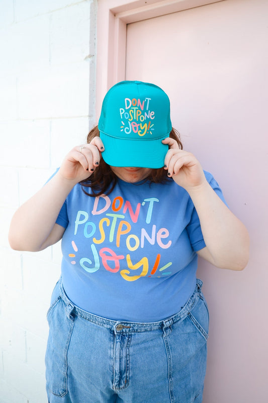 Don't Postpone Joy Trucker Hat