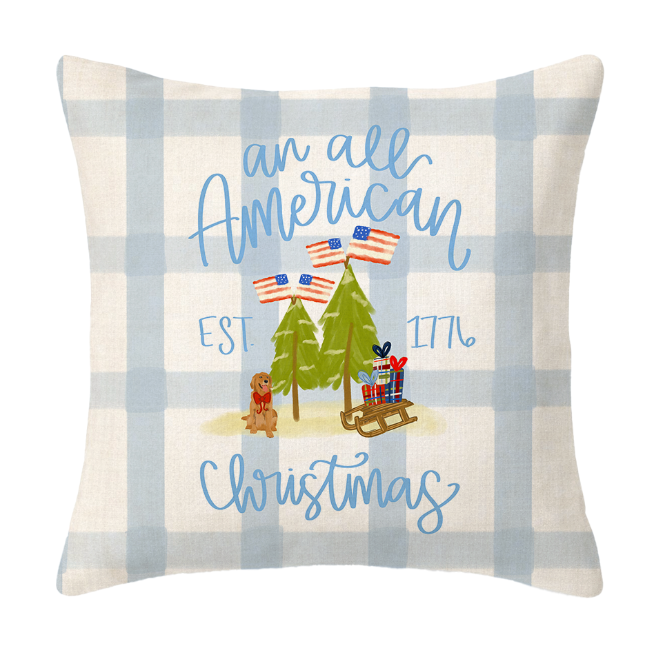 Decorative pillow with plaid pattern, Christmas-themed design, and text 'an all American Christmas'.