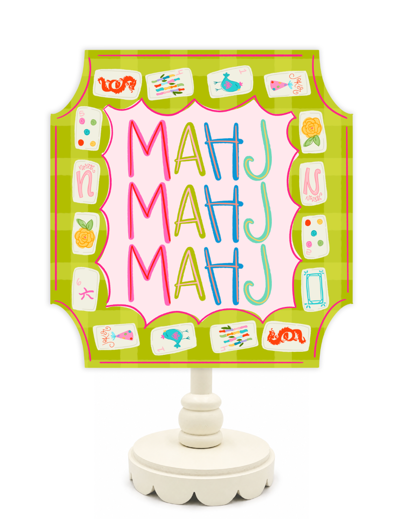 Decorative sign with colorful letters 'MAHJ' on a green background