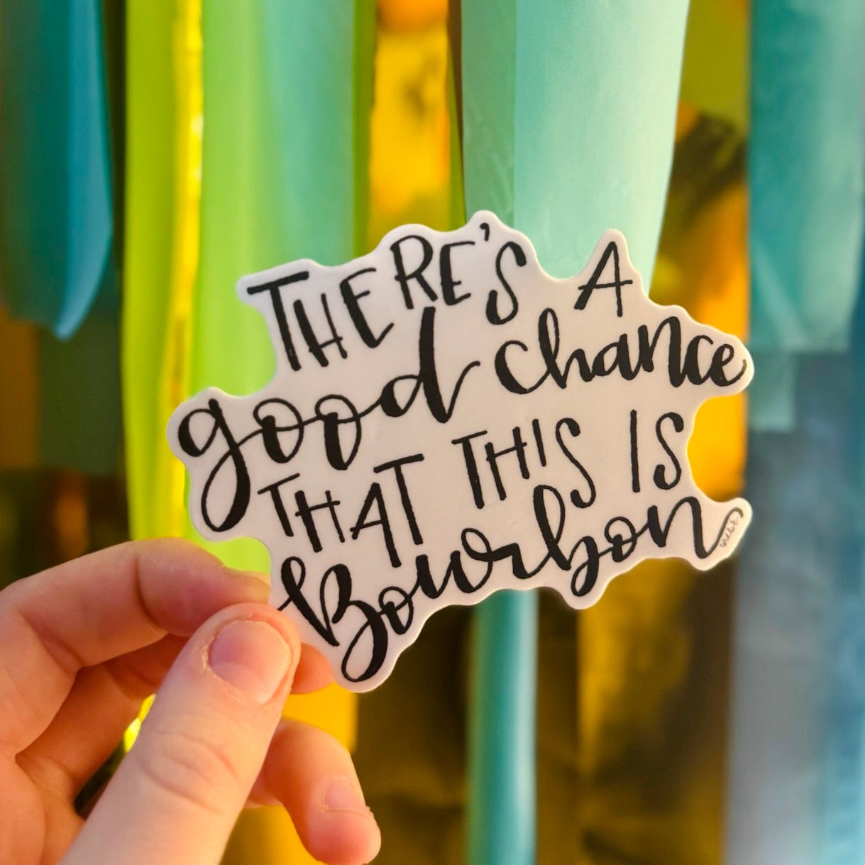 Doodles by Rebekah "There’s a good chance that this is bourbon" sticker. This funny hand-lettered vinyl decal is a perfect gift for bourbon lovers and is ideal for decorating water bottles, laptops, or bar carts.