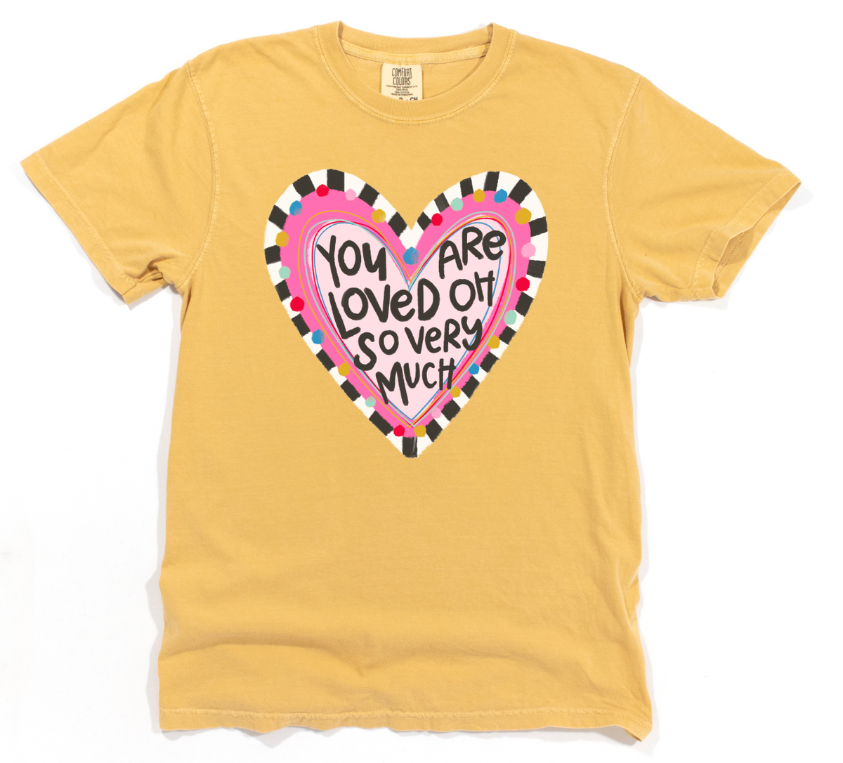 Yellow t-shirt with a colorful heart design and text on a white background