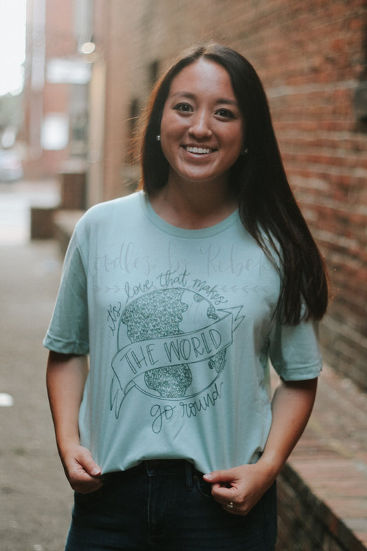 It’s Love That Makes the World Go ‘round Tee