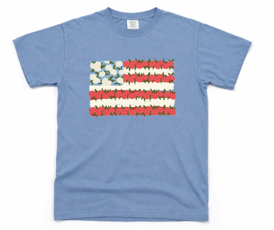 Blue t-shirt with a floral American flag design on a white background
