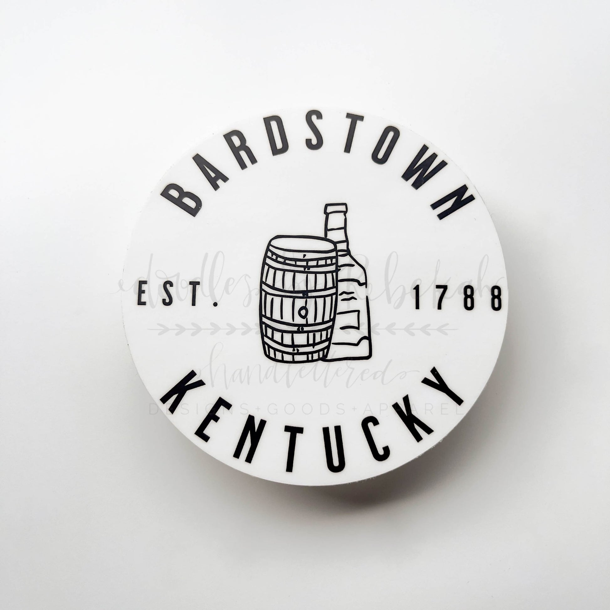 A round white sticker with the text 'BARDSTOWN KENTUCKY EST. 1788' and an illustration of a bourbon barrel.