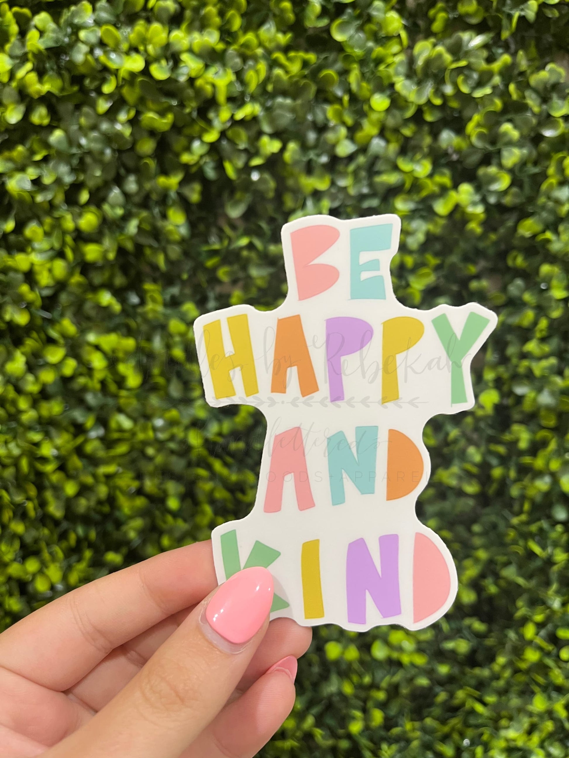 Vinyl sticker with phrase "Be happy and kind"