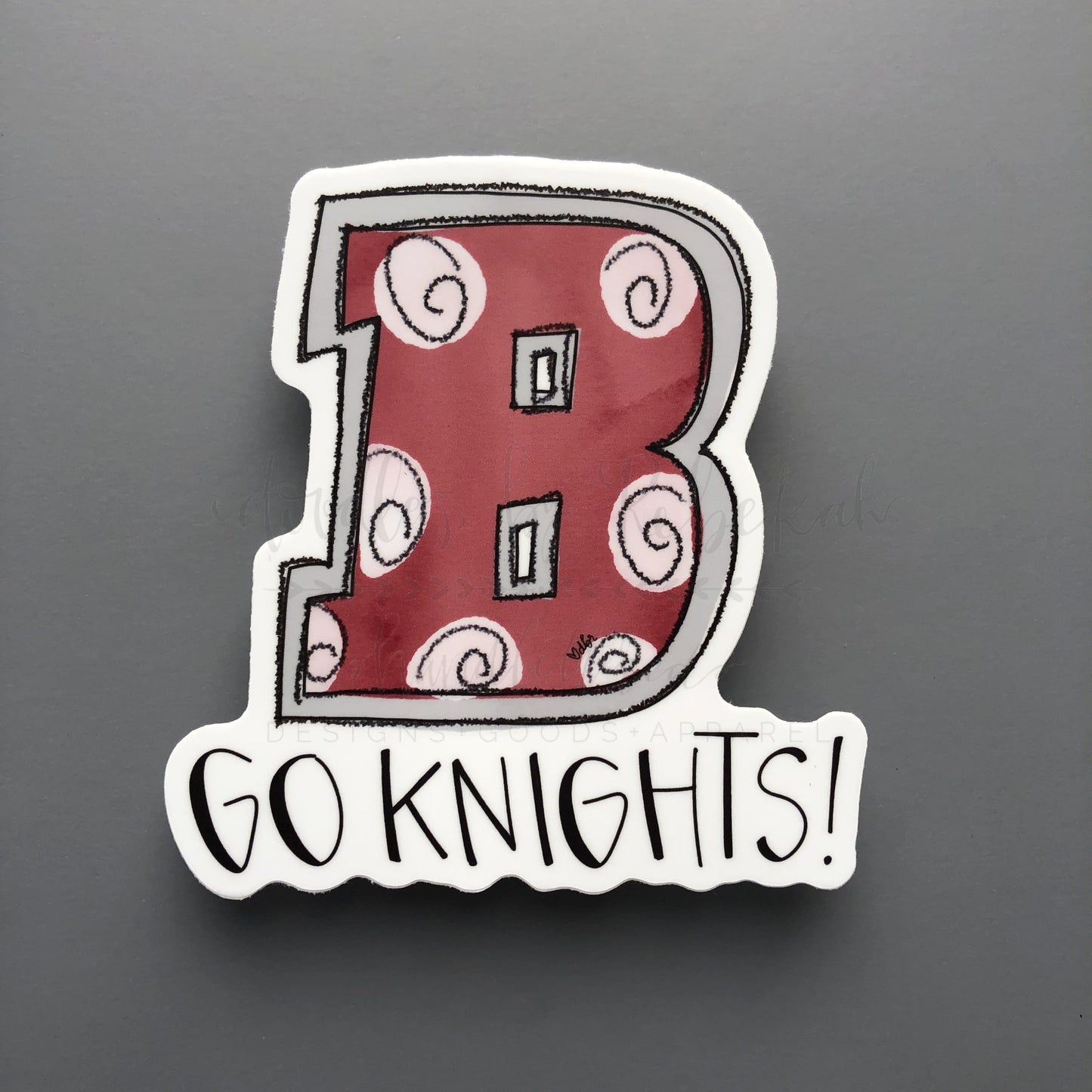 Vinyl sticker with "B Go Knights" in red, grey and black