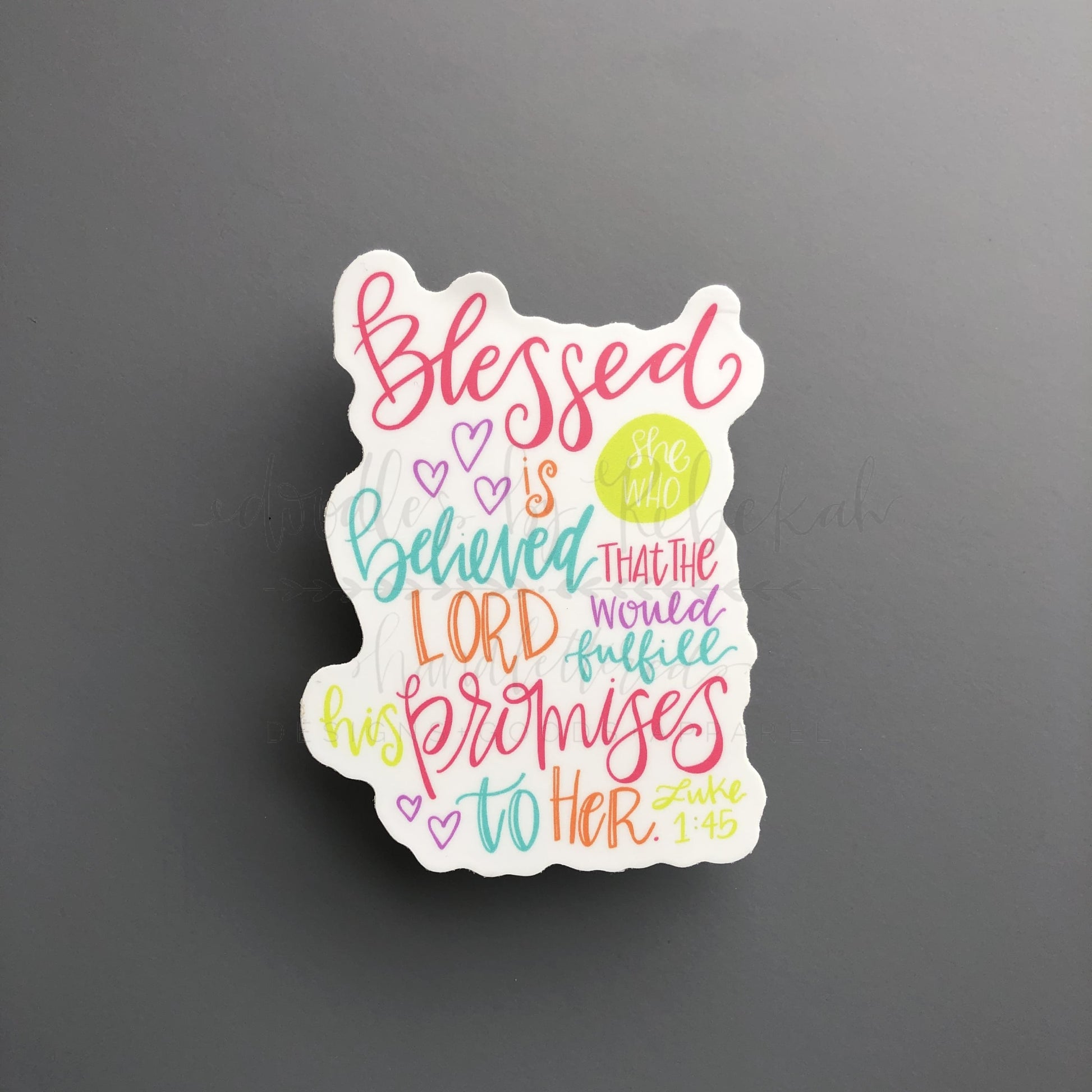 A sticker reading "Blessed is she that believed that the Lord would fulfill his promises to her" bible quote sticker