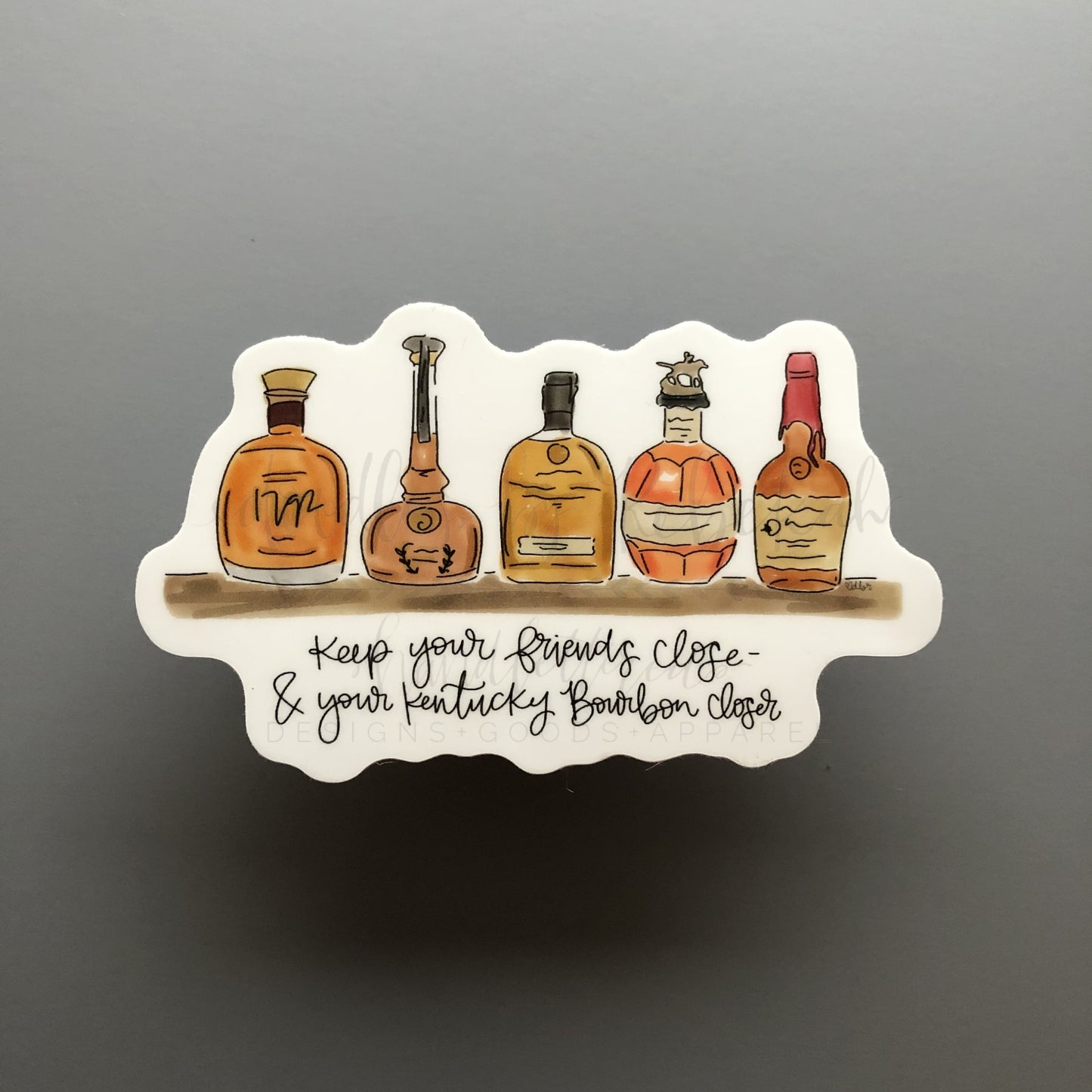 A sticker with an illustration of bourbon bottles and the text 'Keep your friends close & your bourbon closer'.