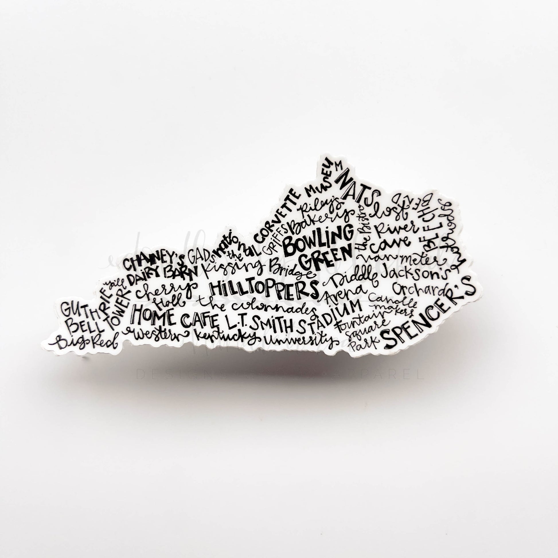 A sticker with word art in the shape of Kentucky, featuring various places and terms related to Bowling Green.