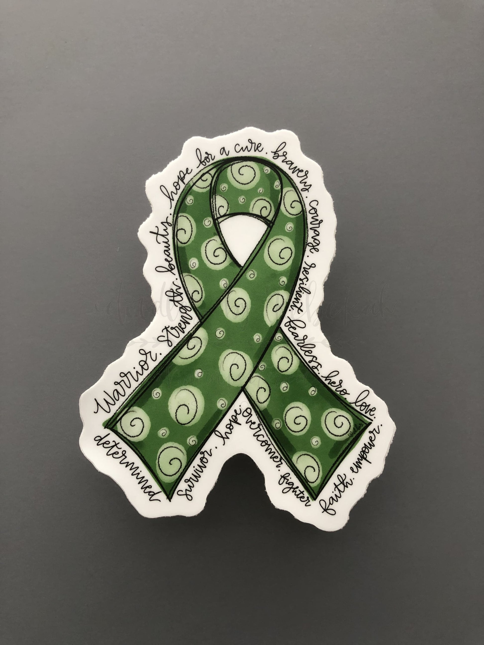 Hand drawn cancer awareness ribbon in Kelly Green