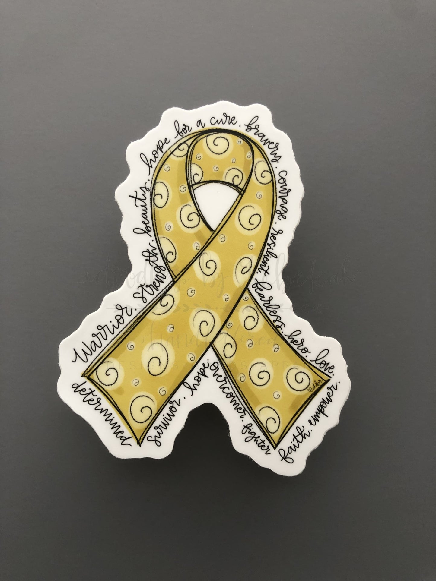Hand drawn cancer awareness ribbon in Gold