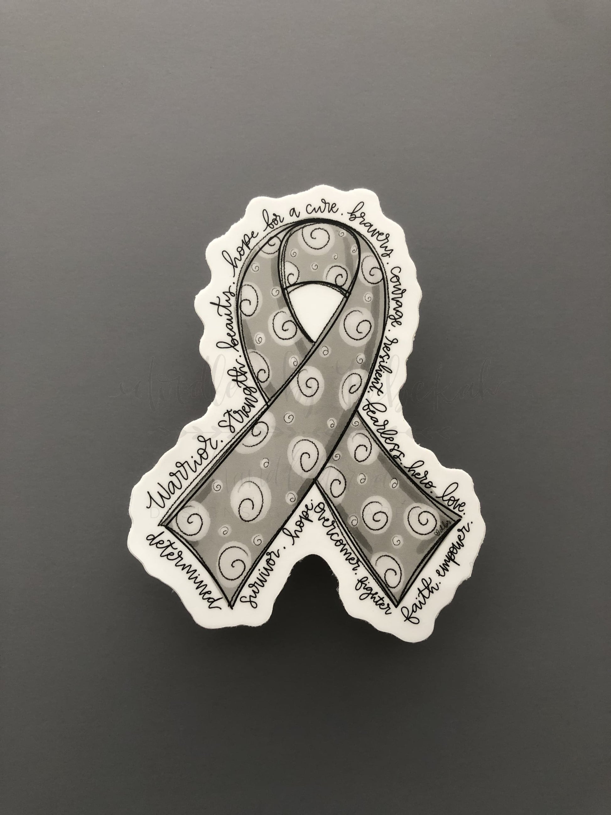Hand drawn cancer awareness ribbon in gray