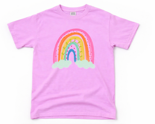 Pink t-shirt with a colorful rainbow design on a white background