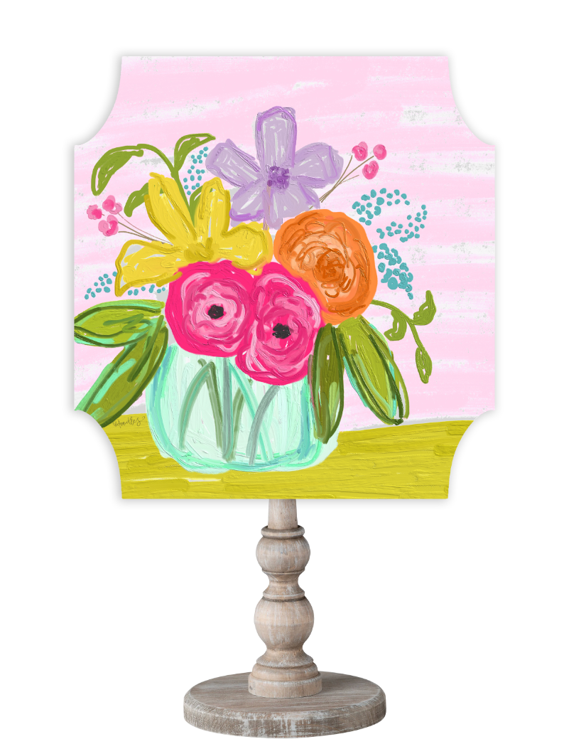Doodles by Rebekah colorful flower bouquet art piece with pink roses and yellow lilies on a rustic turned wood stand.