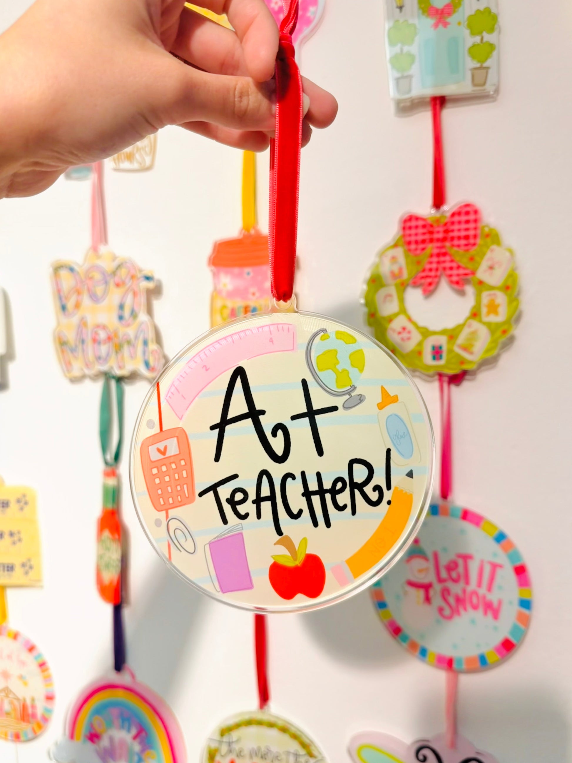 A+ Teacher Acrylic Ornament with school supplies featured