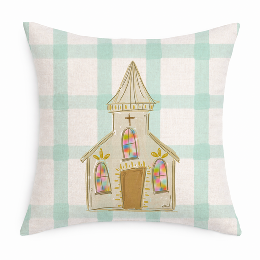 a blue and white gingham pillow with a hand drawn church on a white background