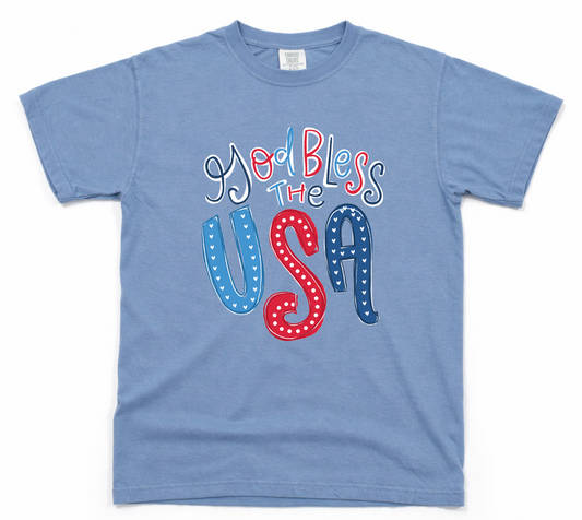 Blue t-shirt with 'God Bless The USA' text in red, white, and blue on a white background