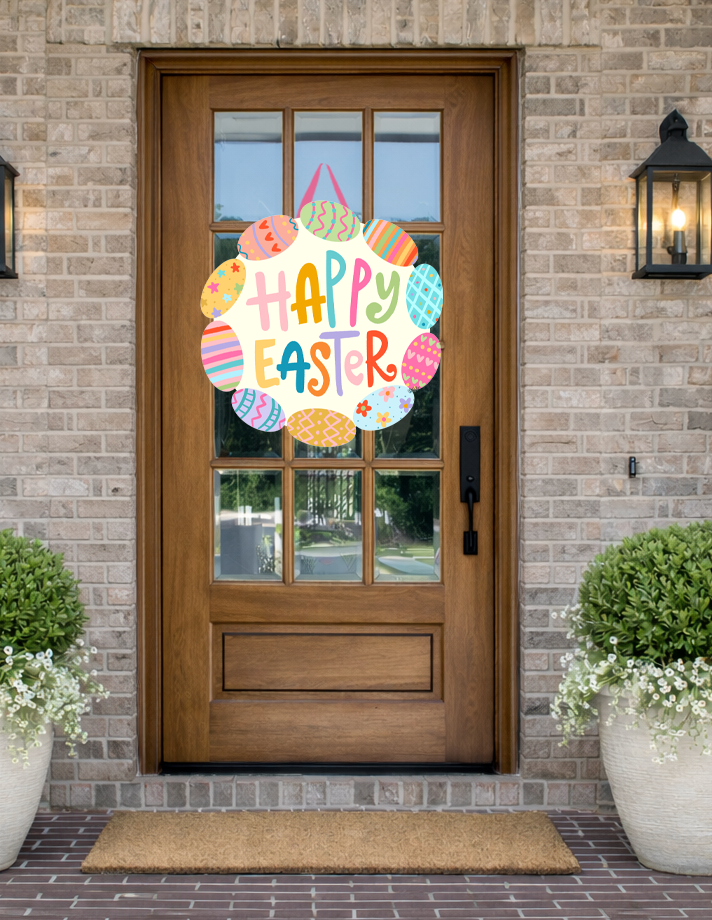 Doodles by Rebekah "Happy Easter" door decor featuring colorful hand-drawn Easter eggs and festive lettering on a rustic front porch.