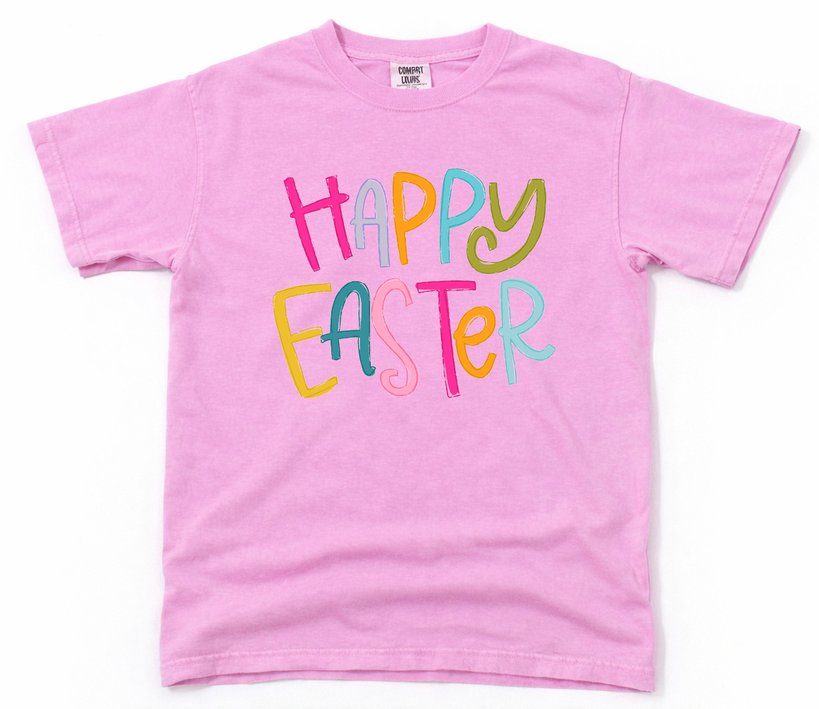 Pink t-shirt with 'Happy Easter' text in colorful letters on a white background