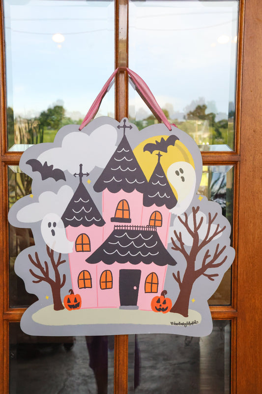 Pink Haunted House with Ghosts Doorhanger