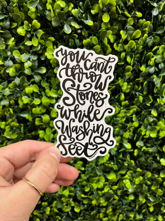 You Can’t Throw Stones While Washing Feet Sticker - Sticker