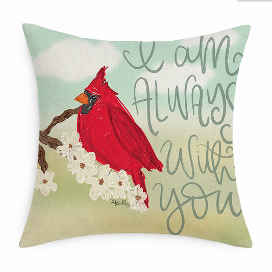 Decorative pillow with a red cardinal and floral design on a light green background