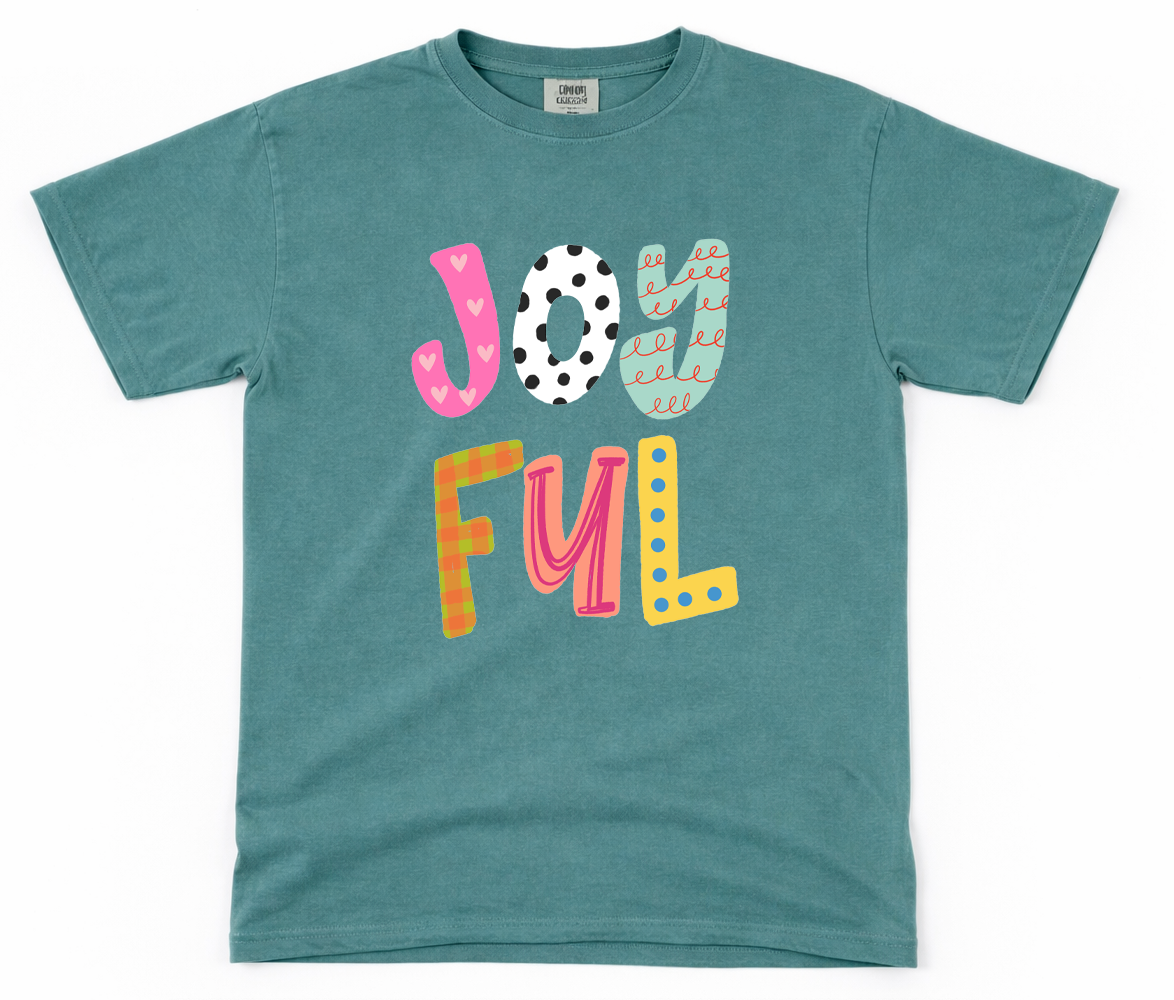 Teal t-shirt with colorful 'JOYFUL' text on a white background
