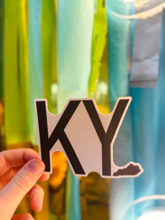 Doodles by Rebekah "KY" Kentucky state pride sticker. This bold, minimalist die-cut vinyl decal is perfect for residents and students to show their Kentucky spirit on laptops, water bottles, and notebooks.