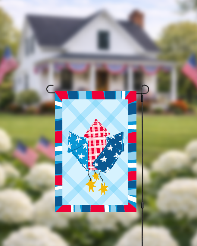 Doodles by Rebekah patriotic fireworks garden flag featuring hand-painted red, white, and blue rockets on a blue checkered background. This Americana-themed outdoor decor is perfect for Fourth of July celebrations, Memorial Day, or summer garden displays.