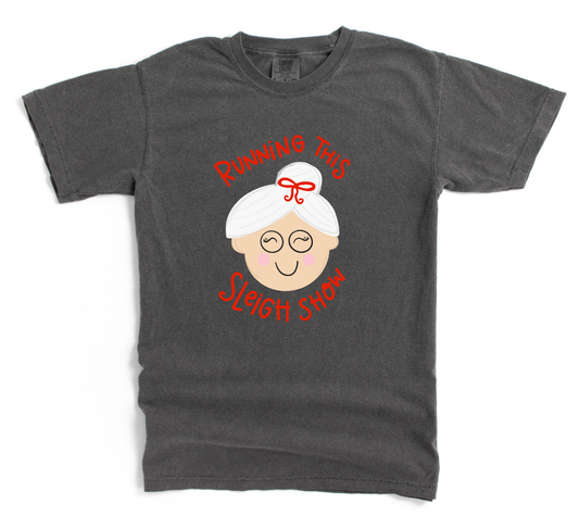 Gray t-shirt with a graphic of an elderly woman and text 'Running This Sleigh Show' on a white background