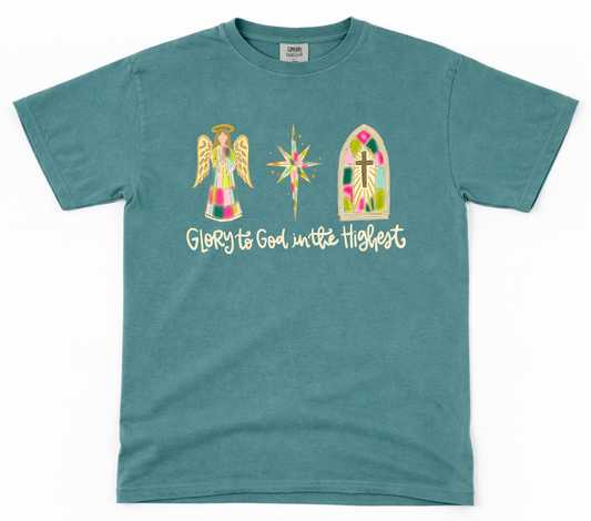 Teal t-shirt with religious graphics and text on a white background