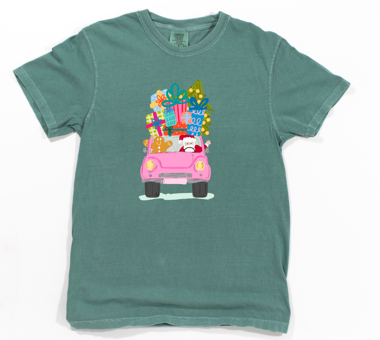 Teal t-shirt with a pink truck and Christmas-themed graphics on a white background