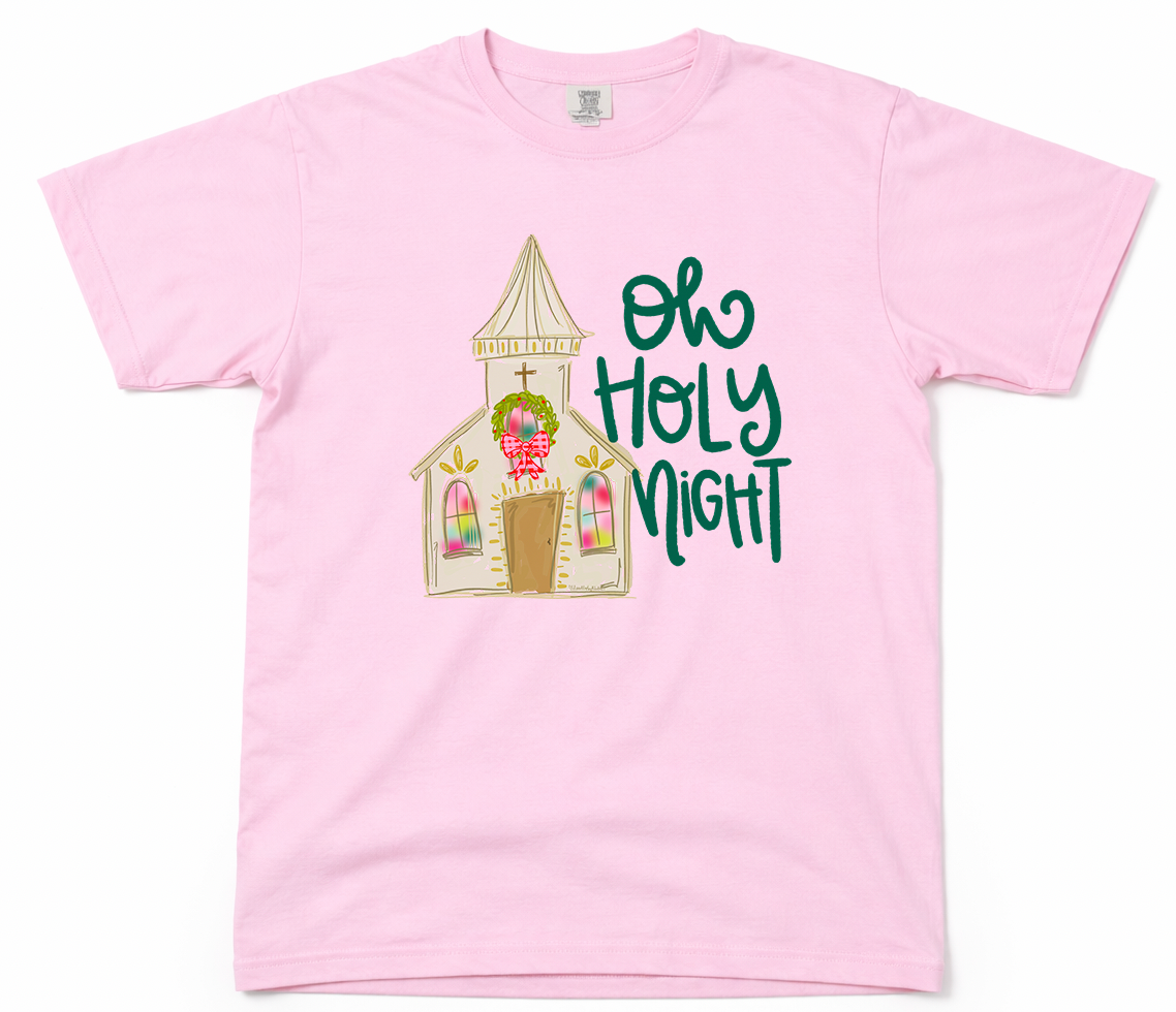 Pink t-shirt with a church graphic and 'Oh Holy Night' text on a white background