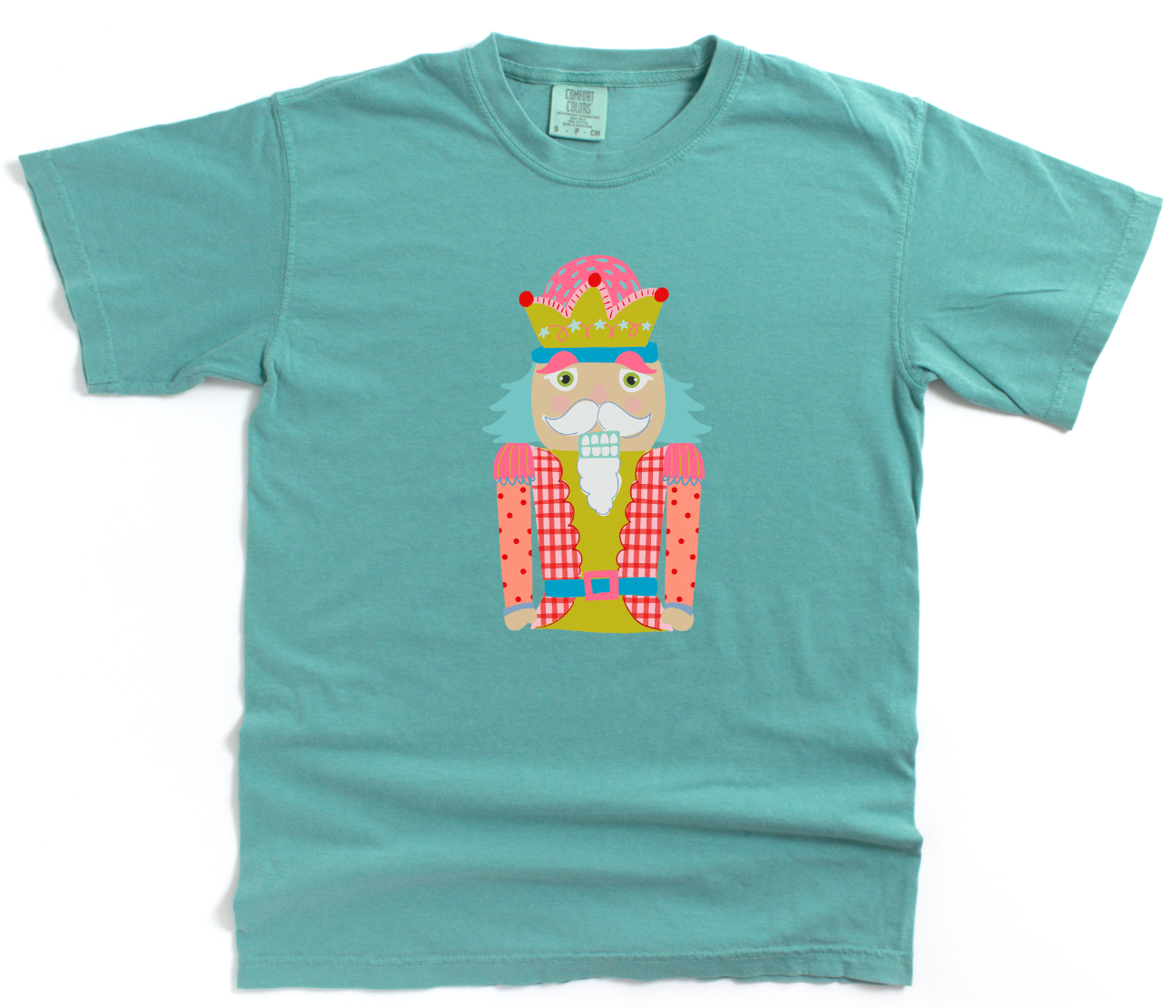 Teal t-shirt with a colorful graphic of a nutcracker on a white background