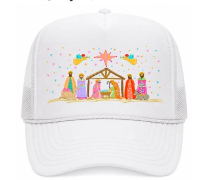 White cap with nativity scene design on a white background