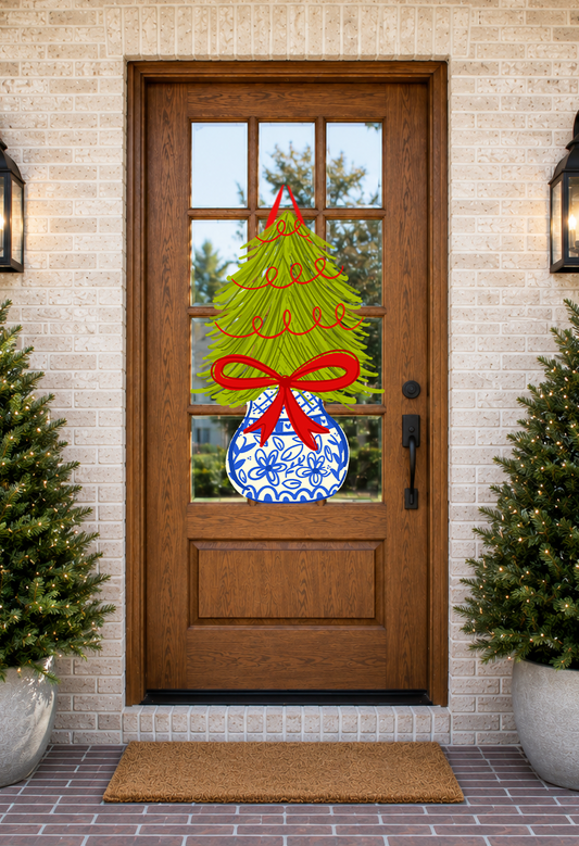 Decorative glass door with Christmas tree design on a brick wall background