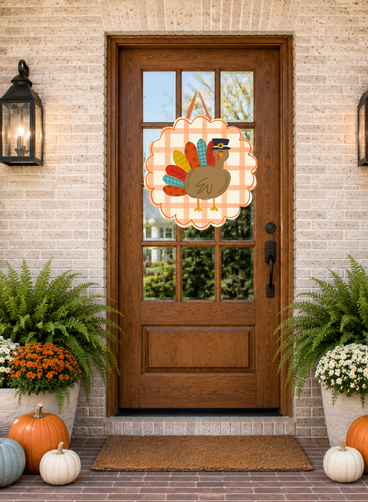 Decorative Thanksgiving door wreath on a wooden front door with pumpkins and plants on a porch.