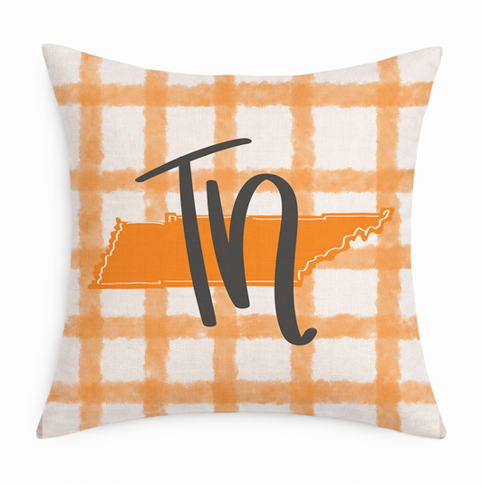 Pillow with orange and white plaid pattern, Tennessee outline, and 'TN' text.
