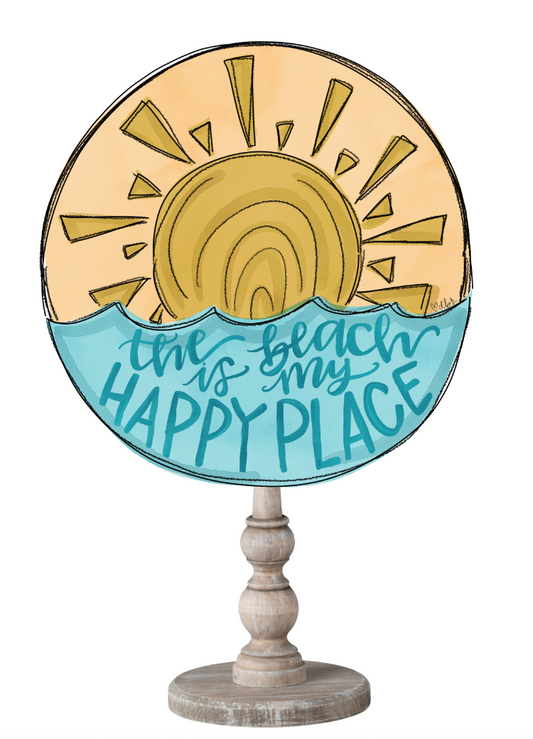 Doodles by Rebekah beach-themed tabletop decor featuring a sun and blue waves with hand-lettered "the beach is my happy place" text.