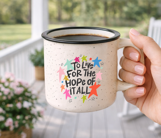 Doodles by Rebekah "To Live for the Hope of It All" inspirational mug. This whimsical hand-painted ceramic coffee cup features vibrant star illustrations and positive typography, making it a perfect gift for fans of meaningful lyrics, graduation gifts, or daily encouragement.