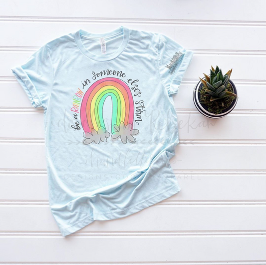 Be The Rainbow In Someone Elses Storm - Tees